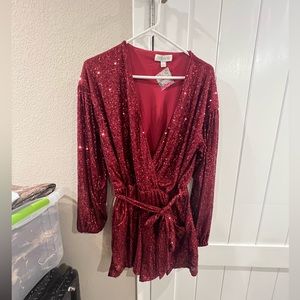 The perfect holiday party outfit!   Sequin shorts one piece long sleeve romper.